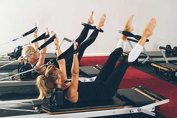 80s-Themed Reformer Pilates classes
